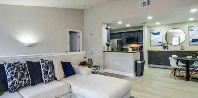 At the top of the stairs is the kitchen - 8923 Manor Loop