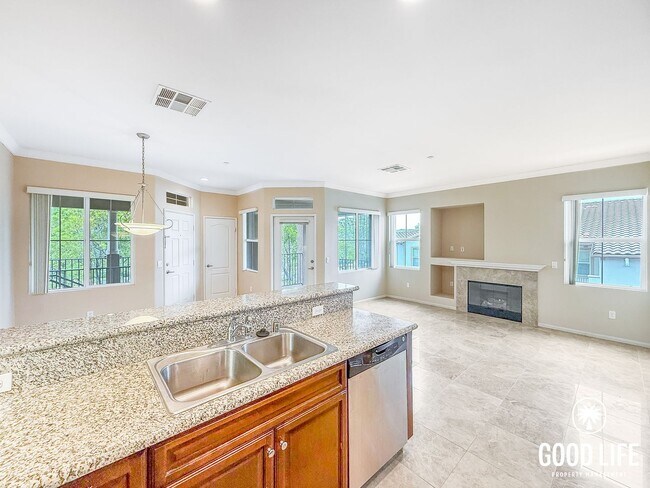 Building Photo - Bright 2BD/2BA Condo in Sabre Springs with Covered Balcony, In-Unit Laundry & Garage
