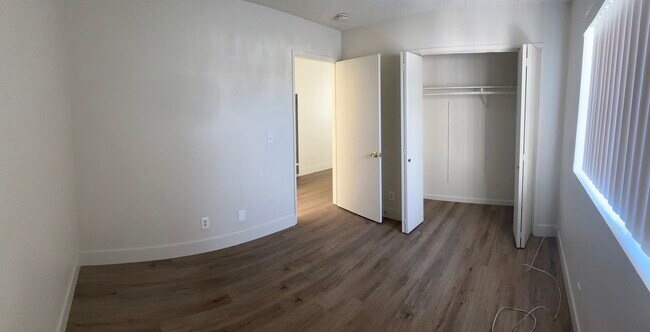 Bedroom door, closet and bedroom - 200 S Carondelet St