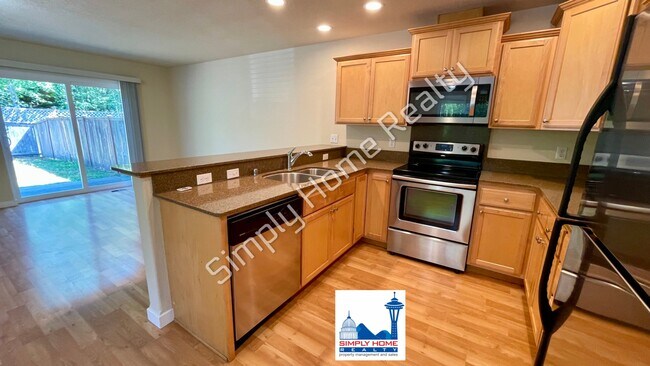 Building Photo - Welcome to Your Corner-Lot Retreat!