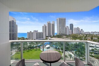 Building Photo - 19370 Collins Ave