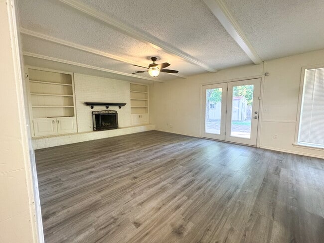 Building Photo - "Charming 3/2/2 With Extra Storage"