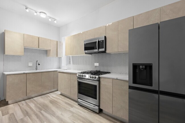 Foto del edificio - 7627 S Lowe Ave
