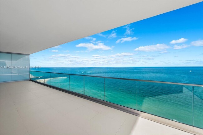 Building Photo - 10201 Collins Ave