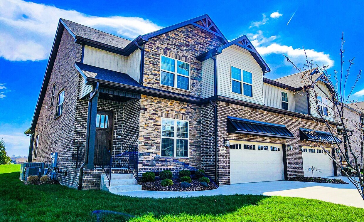 Primary Photo - Elegant All-Brick Townhome in a Gated Comm...
