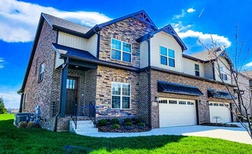Building Photo - Elegant All-Brick Townhome in a Gated Comm...