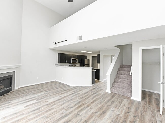 Living Room with Hardwood-Style Flooring - Riverset