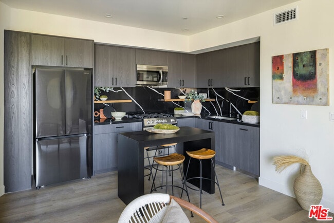 Foto del edificio - 1110 Spaulding Ave