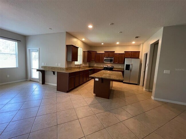 Foto del edificio - 8603 Fiddleleaf Ct