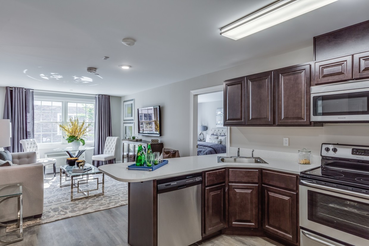 Cocina y sala de estar - Fairfield Fieldstone At Farmingdale