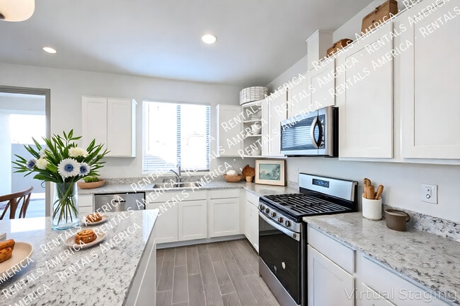 Building Photo - 9344 E Spiral Ave