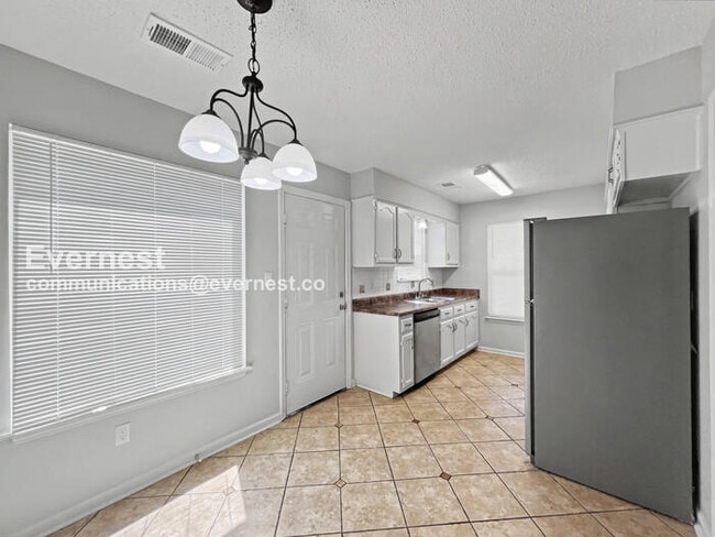 Photo - Limited Time Special Offer / 3 Bed, 2 Bath Home with Fenced Yard / Pet-Friendly / Coming Soon!