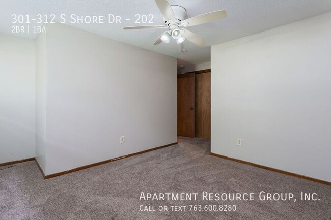 Building Photo - 301-312 S Shore Dr-202