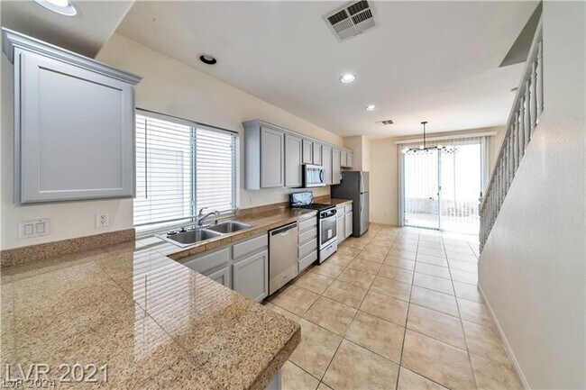 Building Photo - 1703 Bamboo Rain Ave
