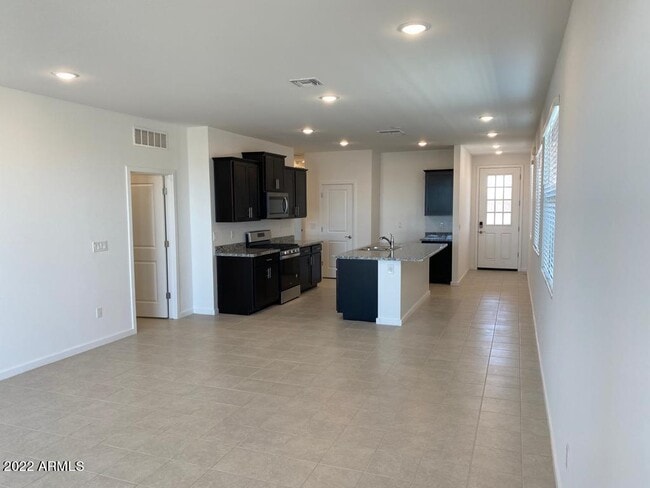 Building Photo - 40030 W Rio Lobo Dr