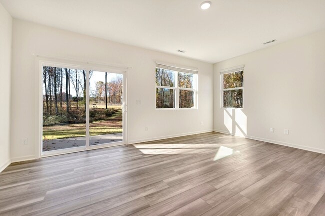 Building Photo - Brand-new, end-unit townhome!