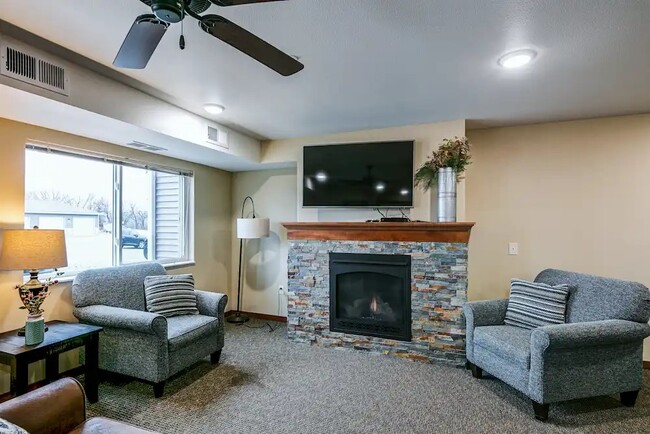 Cozy fireplace in the Community Room - Mayhew Apartments