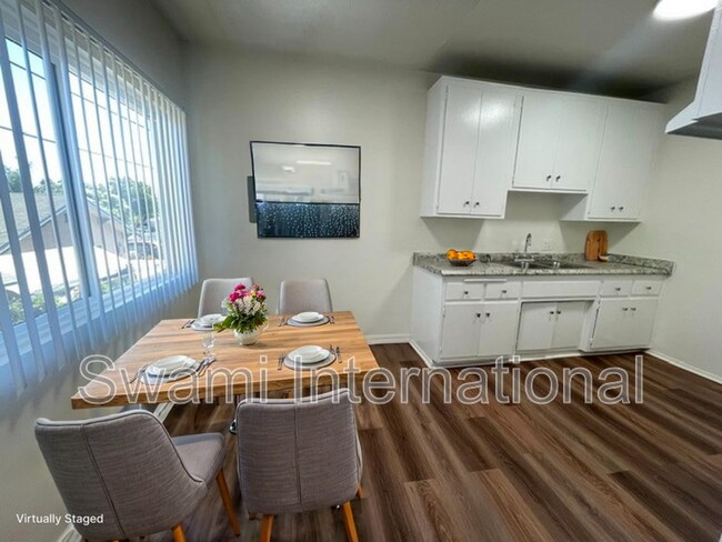 Building Photo - 10970 S Figueroa St