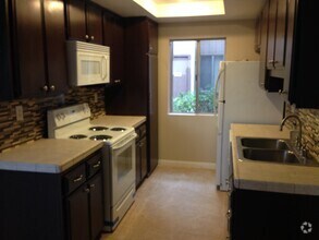 Building Photo - 6560 College Grove Dr