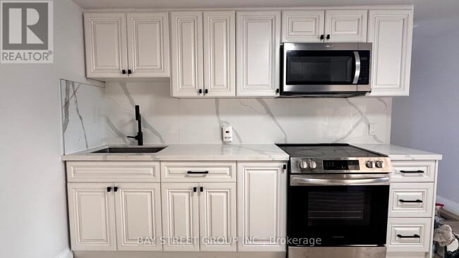 Building Photo - 5731 Stanley Ave