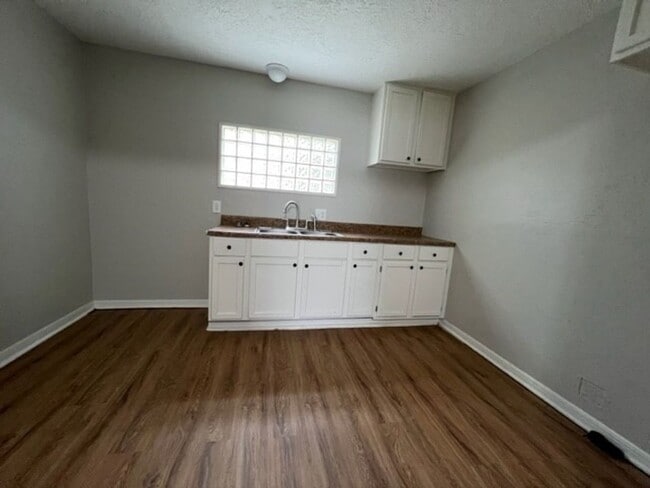 Building Photo - 1210 NW Baldwin- COMING SOON!