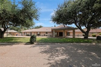 Building Photo - 9812 Las-Palmas Dr
