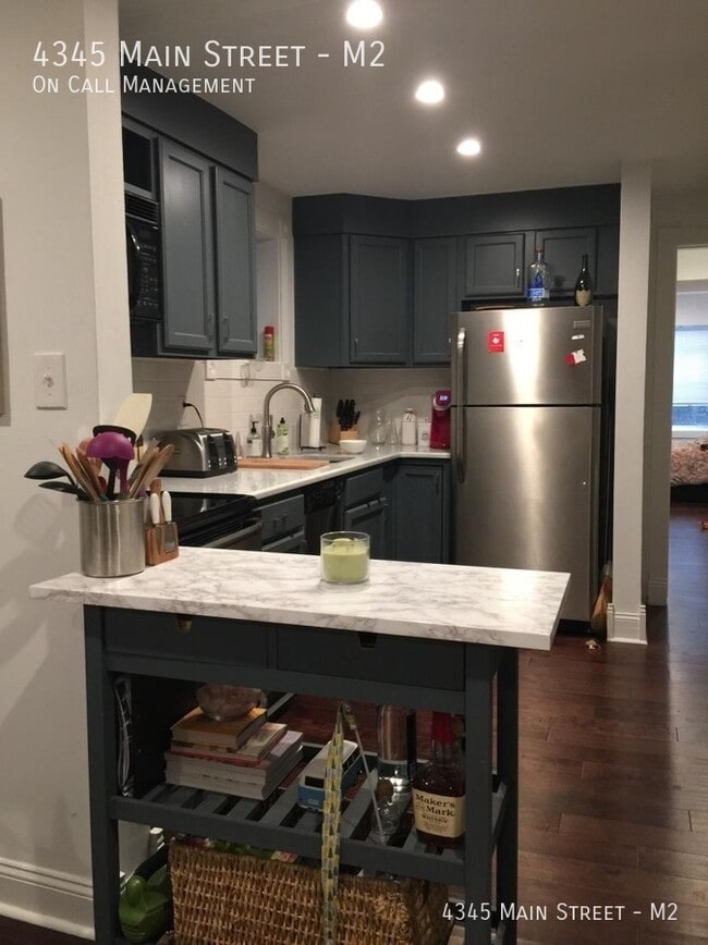 Photo - 4345 Main St Apartment