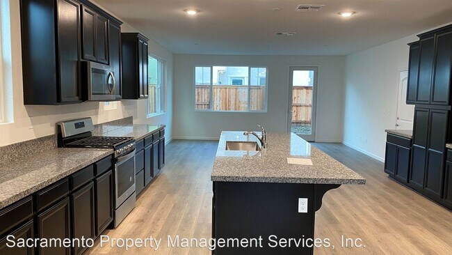 Building Photo - 4 br, 3 bath House - 2458 Buzz Aldrin Way