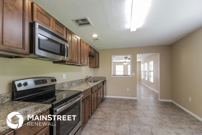 Foto del edificio - 6090 Wilderness Ave