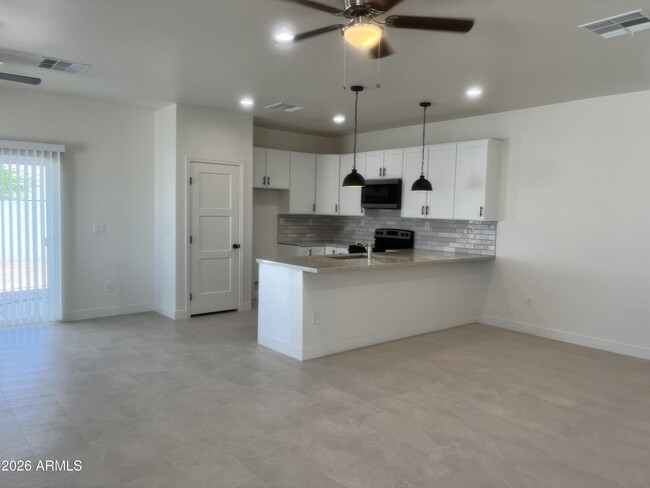 Building Photo - 10480 W Monaco Blvd