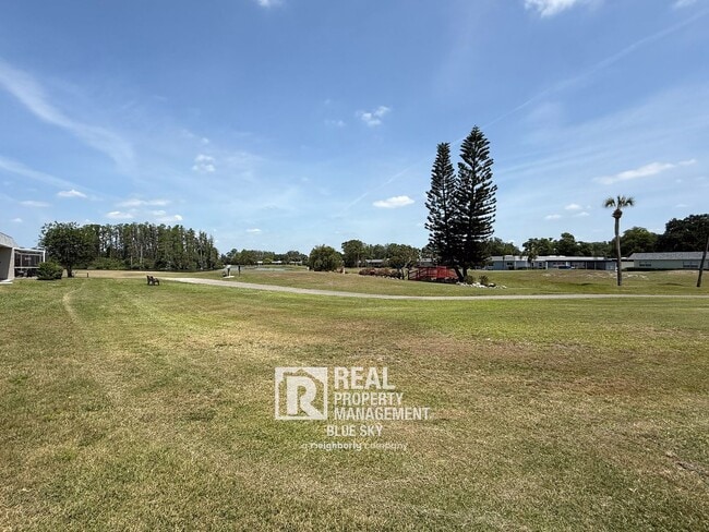 Building Photo - 9639 Greenskeeper Dr