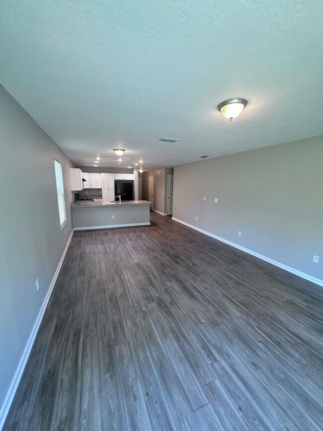 Building Photo - Gorgeous 4-Bedroom Home with Granite Counters & 2-Car Garage