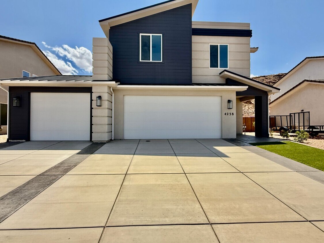 Primary Photo - BRAND NEW Four Bedroom Townhome in Desert ...