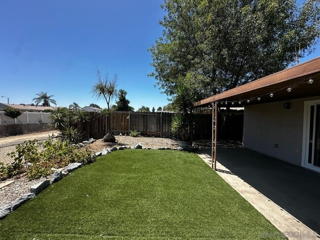 Building Photo - 10017 Woodrose Ave