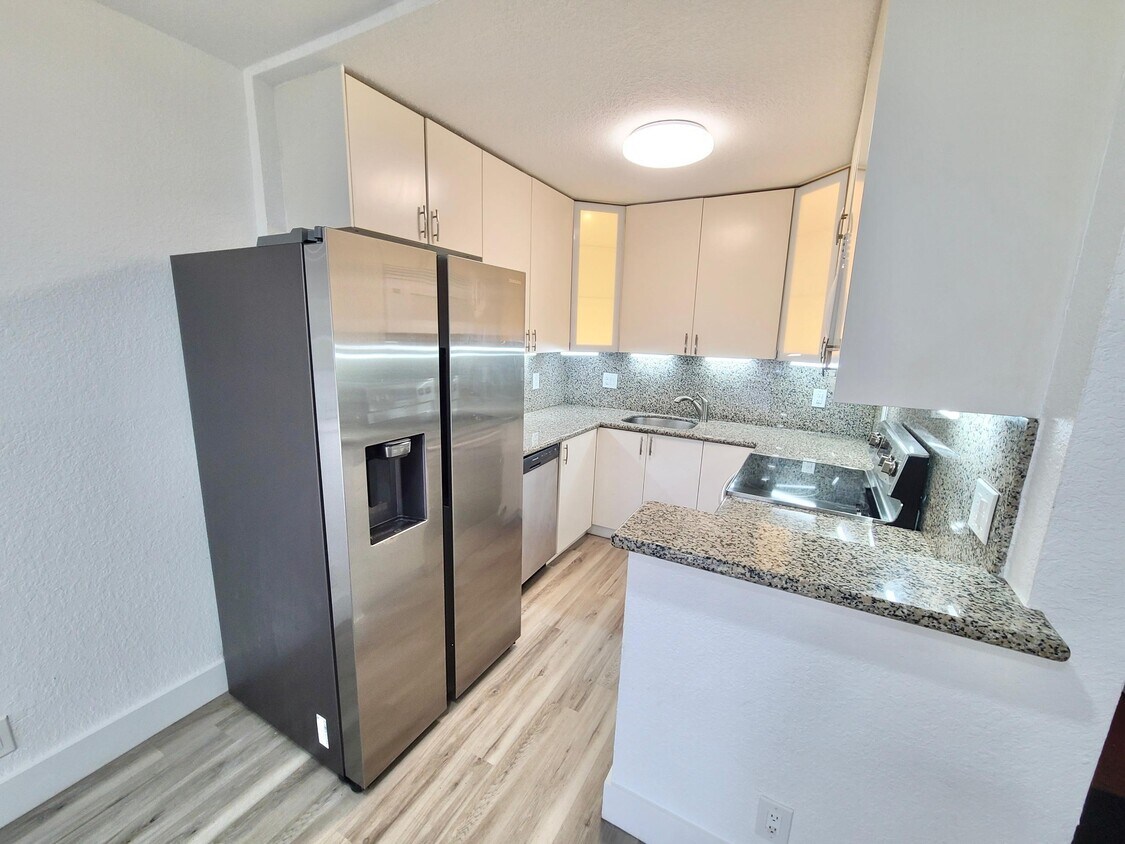 Foto principal - 610 NW 13th St