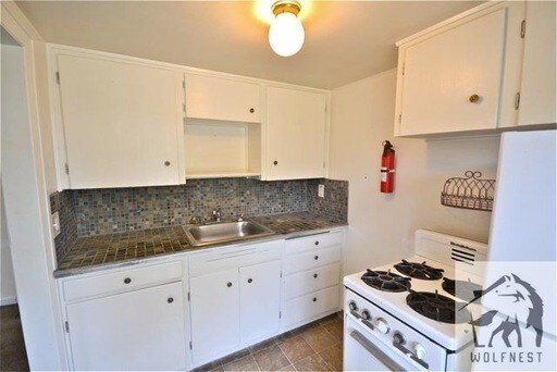 Foto principal - 820 E 3rd Ave