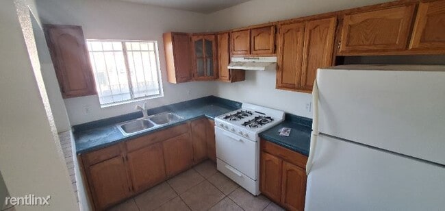Building Photo - 2 br, 1 bath House - 8416 1/2 Graham Ave