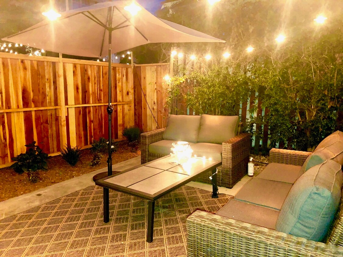Private fenced patio w/ outdoor furniture - 35 Dudley Ave