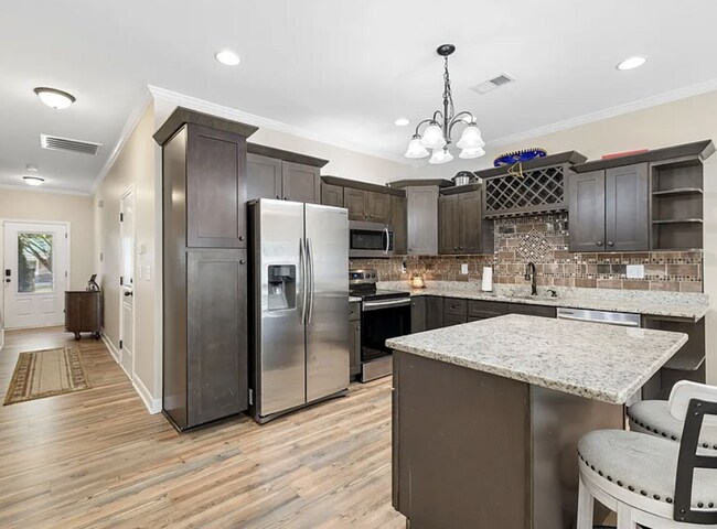 Building Photo - Walk to Lebanon Square | Updated 3-Bedroom Townhome with Fenced Yard