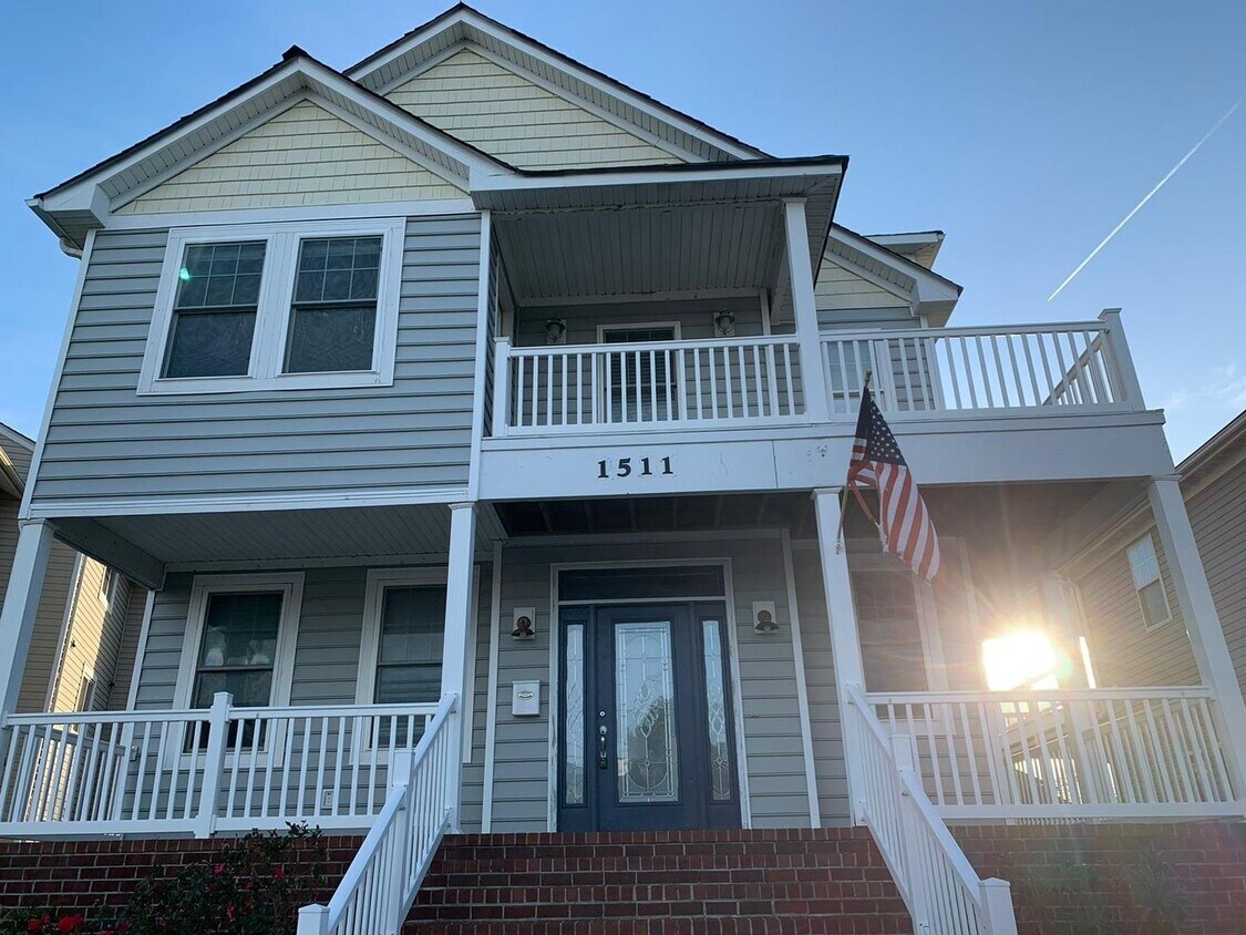 Primary Photo - Welcome to this stunning 3-story Beach Cot...