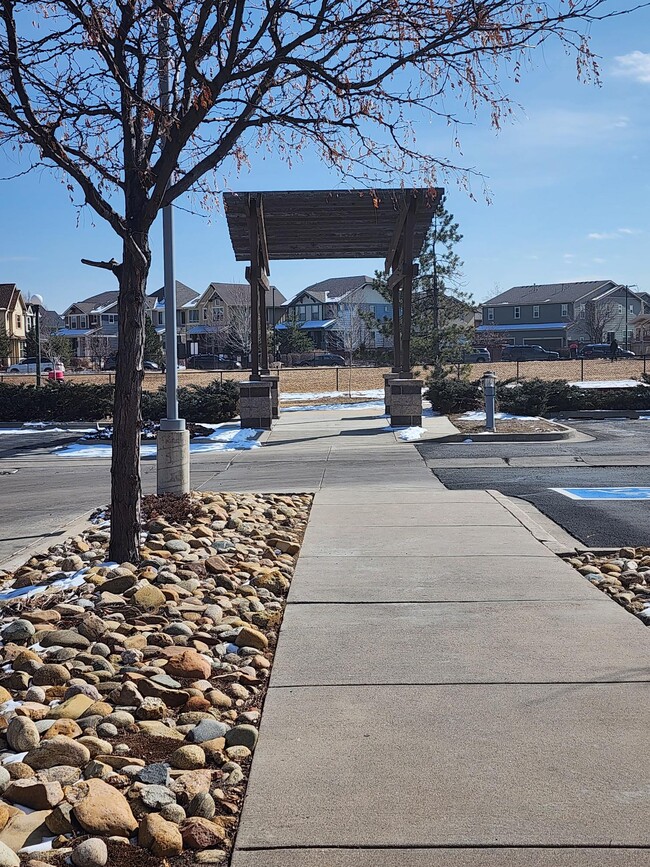 On property walkway to dog park - Parkside Apartments - Affordable Housing