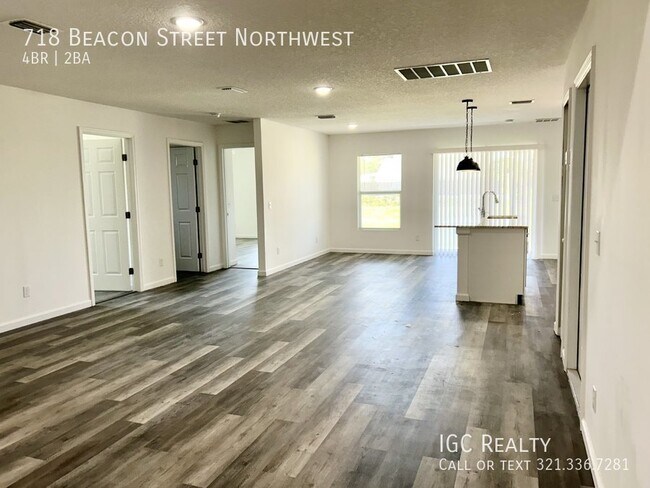 Building Photo - "Modern 4-Bedroom Home with Granite Counte...