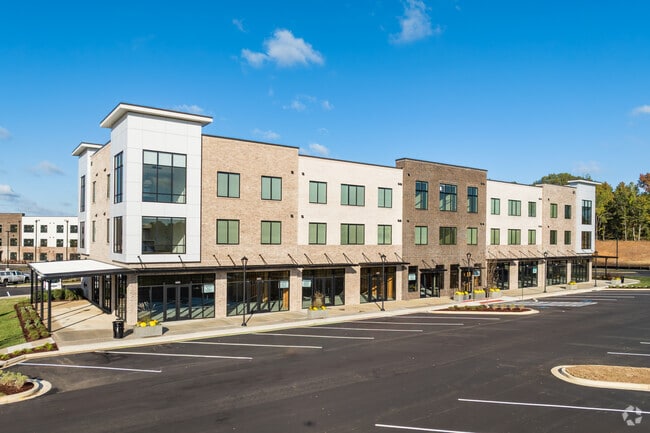 Building Photo - The Flats at Delta Landing