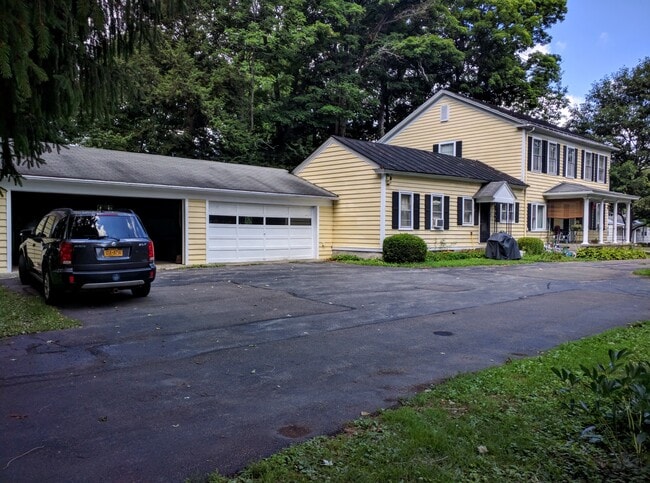 Garage with automatic door - 92 S Main St