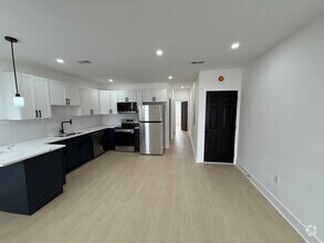 Building Photo - 1012 W Lanvale St