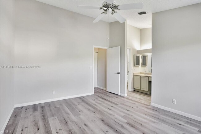 Building Photo - 2 br, 2.5 bath House - 4615 Carambola Cir ...