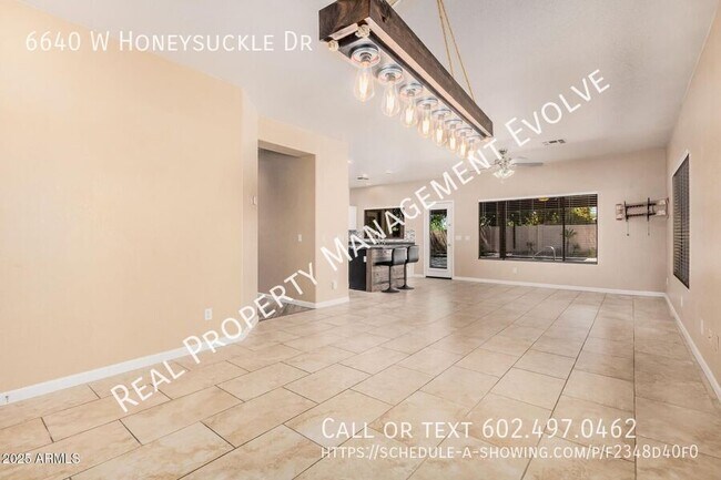 Foto del edificio - 6640 W Honeysuckle Dr