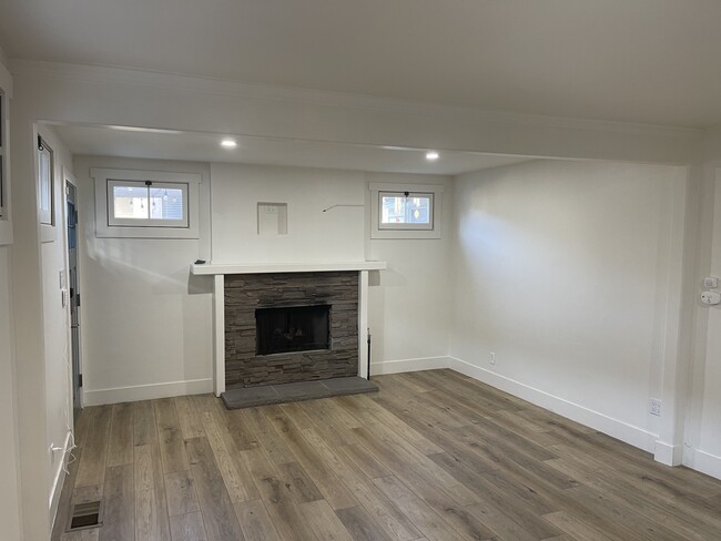 Living Room with gas fire place - 829 N Gaffey Pl