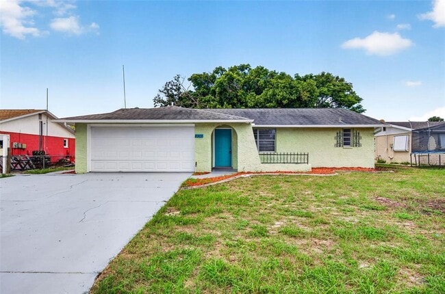 Building Photo - 8905 Tropical Palm Way