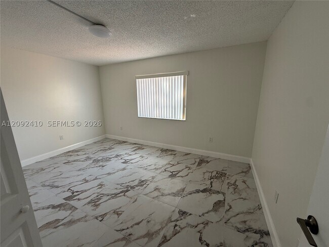 Building Photo - 551 NW 82nd Ave
